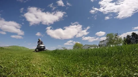 Lawn tractor super closeup cutting grass Stock-Footage 50064810