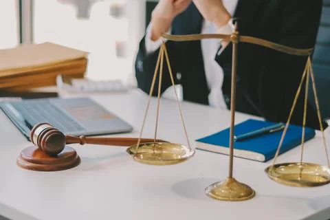 Lawyer explained to the client about the law that must be brought against t.. Stock Photos