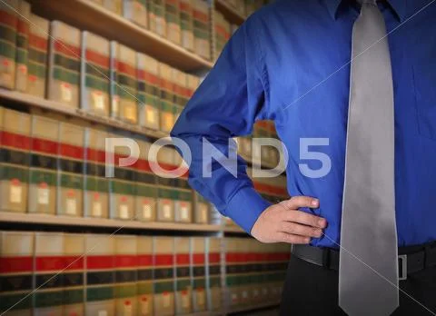 Lawyer Man in Library with Books Stock Photos