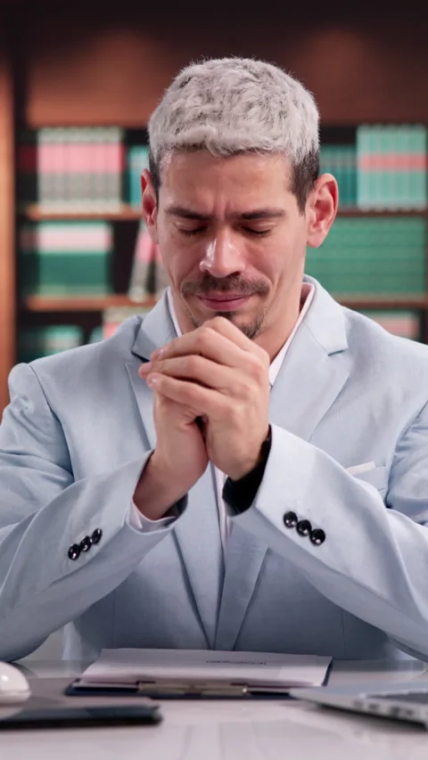 Lawyer Praying Thoughtfully At Desk Stock Footage 333399335