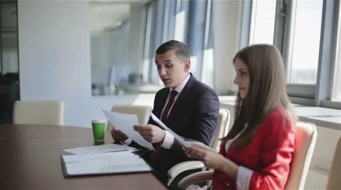 A lawyer is reading the document aloud. Stock Footage 63818100