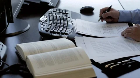 Lawyer reviewing a contract Stock Footage 64334502