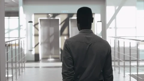 Lawyer riding elevator Stock Footage 121145576