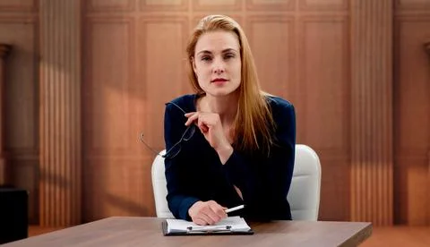 Lawyer Studies Important Case Files Closely During Online Video Meeting. Stock Photos