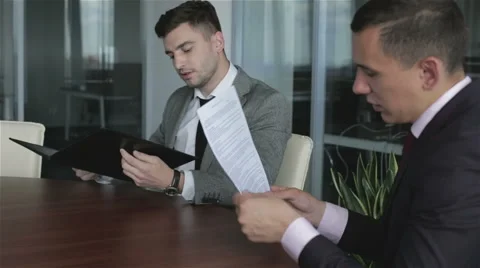 The lawyer working with the client. Time to sign the contract. Stock Footage 63574938