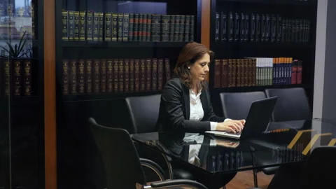 Lawyer is working on a laptop Stock Footage 154335746