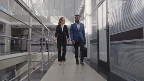 Lawyers talking at work Stock Footage 121157321