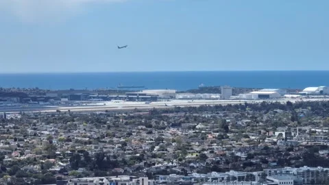 LAX Airport and Suburbs Los Angeles California Drone Aerial View Stock Footage 335390853