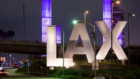 LAX Airport Los Angeles Sign With Light Colors Night Timelapse Stock Footage