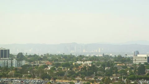 LAX DELTA PLANE PASSES IN FRONT OF LOS ANGELES Stock Footage 153480121