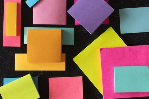 Lay flat background of colorful multi shaped not pad Stock Photos