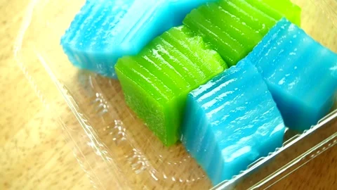 Layer dessert or Kanom Chun, Thai traditional dessert, in studio  Chiangmai Thai Stock Footage 244891487