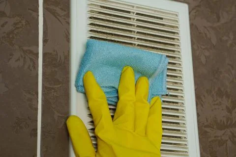 A layer of dust on the ventilation grate.Dust is wiped with a cloth Stock Photos