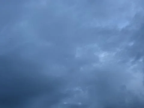 Layered Blue Gray Clouds at Dusk Stock Photos