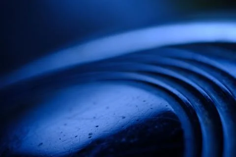 Layered circle texture background with blue light Foto stock