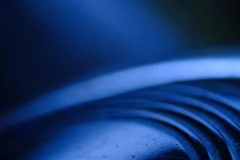 Layered circle texture background with blue light Stock Photos