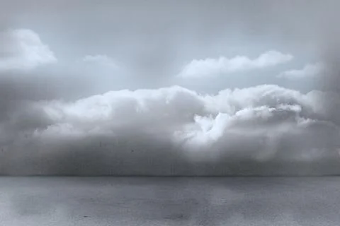 Layered cloud formation is spanning above calm ocean surface in flat design, Stock Photos