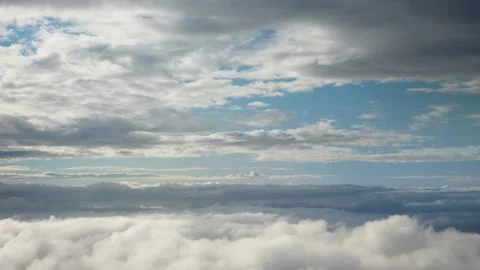 Layered clouds and atmospheric meteorological conditions in high altitude sky Stock Footage 343950255