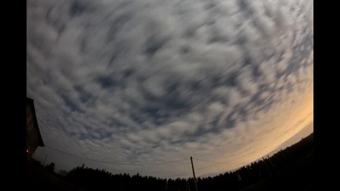 Layered clouds are floating in the sky and Night is coming timelapse Stock Footage 91669791