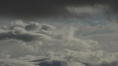 Layered clouds slowly flow on the sky. Stock Footage 143650302