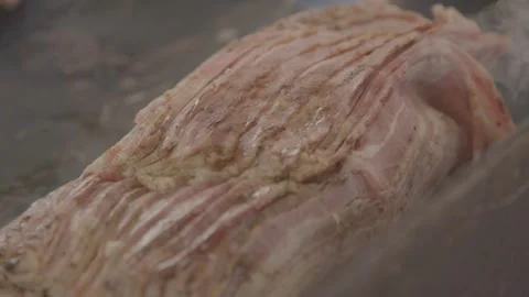 Layered Cooked Meat Steaming on Hot Surface at Sydney Market in Australia Stock Footage 345712641