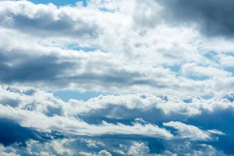 Layered Dramatic Clouds in a Blue Sky. Foto stock
