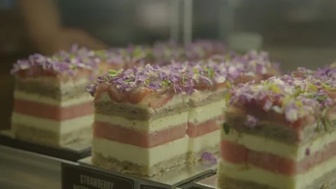 Layered Fruit and Cream Pastries Displayed in Cafe Counter, Sydney, Australia Stock Footage 345655136