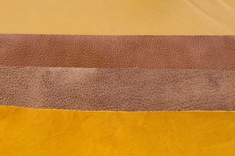 Layered Leather Sheets in Beige Brown and Yellow Flat Lay Texture Background Stock Photos