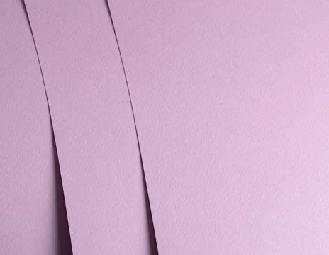Layered matte paper background in soft pink and lilac tones with gentle ver.. 库存照片