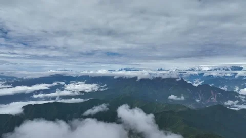 Layered Mountain Ridges Under Dramatic Sky in Niubeishan, China Stock Footage 344034850