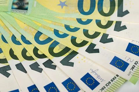 Layered pattern of euro banknotes forming radial fan, emphasis on numerals an 写真素材
