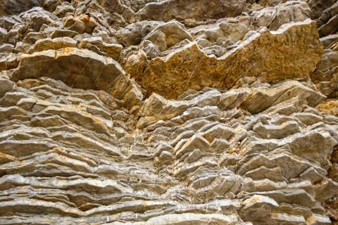 Layered rocks, geologic structure, stone texture Fotos de archivo