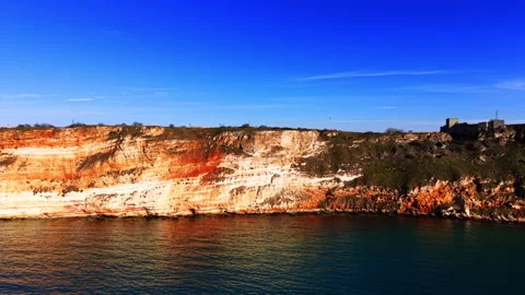 Layered sandstone cliffs above the Black Sea, Bulgaria Stock Footage 336726704