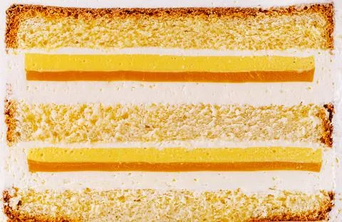 Layered Sponge Cake With Fruit Jelly Filling Stock Photos