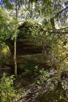 Layered stone remnants-megaliths of fine-crystalline quartz sandstone surroun Stock Photos