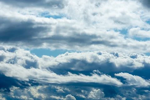 Layered Stormy Clouds with Deep Contrast and Light Blue Sky. Foto stock