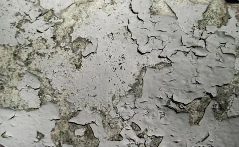 Layered texture of old paint. White flaky surface of whitewash falling out Stock Illustration