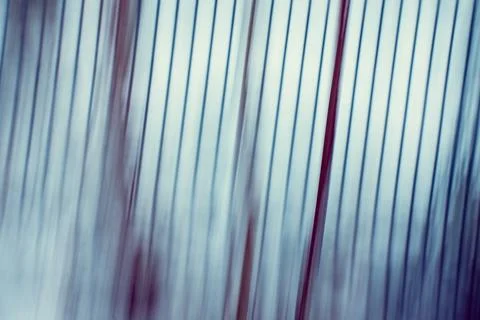 Layered translucent shapes shift across soft gradient. Motion blur creates .. Stock Photos