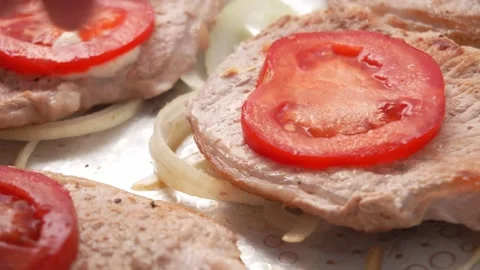Layering Tomato on Grilled Pork. Stock Footage 255746036