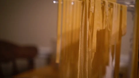 Layers of Fresh Pasta on Drying Rack Stock Footage 97276872