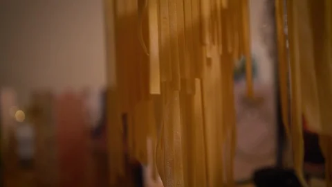 Layers of Fresh Pasta Drying on Racks Stock Footage 97276837