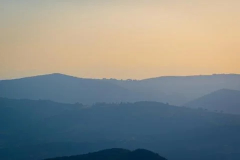 Layers of hills at sunset Stock Photos
