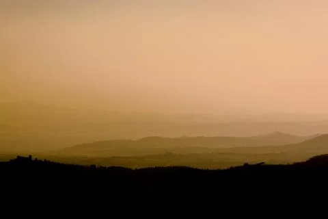 Layers of hills at sunset Stock Photos