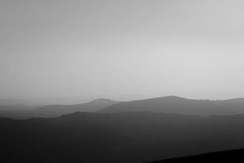 Layers of hills at sunset Stock Photos