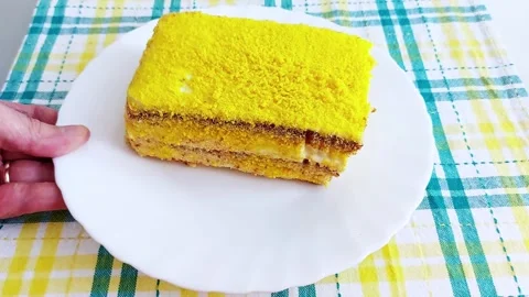 Layers of Light: Soft Sponge Cake Served with Careful Hands Vídeos de archivo 312444475