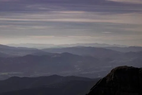 Layers of misty mountains Stock Photos