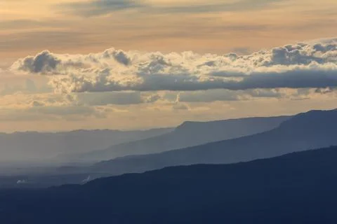 Layers of mountains with clouds abstract background twilight Thailand Stock Photos