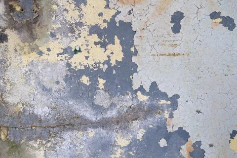 Layers of peeling paint on old wall Stock Photos
