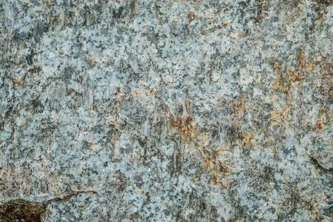 Layers of rocks. An interesting background with a mesmerizing marble texture Stock Photos
