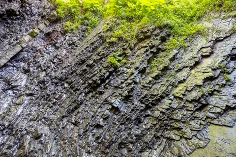 Layers of rocks under the influence of long-term water Stock Photos
